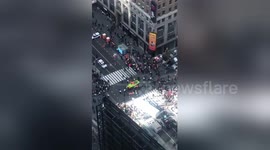 NYC Extinction Rebellion protestors show up in a boat and shut down Times Square