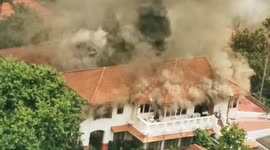 Firefighters battle flames ripping through Indonesian Embassy in Bangkok