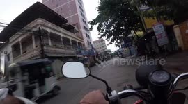 British biker hurled to the ground after motorcycle thieves tried to grab his girlfriend's gold chain