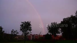A rainbow in the beginning of autumn in Madrid, Spain