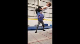 Girl learning gymnastics skill fails