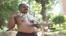 Incredible 'magnetic man' has unusual ability to attract metal objects to his body in central India