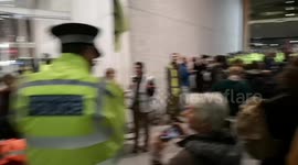 Extinction rebellion protestors protest outside the news building near the shard