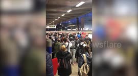 Mind the scrap: Two Extinction Rebellion protesters dragged off roof of London tube by angry commuters