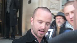 Aaron Paul signs for fans when he  leaves  his hotel to attend  The Jonathan Ross Show to promote the new Breaking Bad movie El Cimino