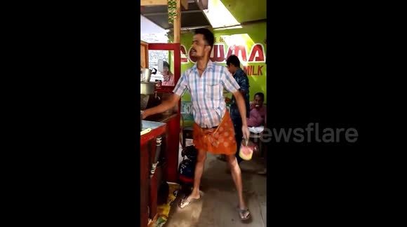 Incredible tea seller pours tea from a height of one metre without spilling the drink in southern India