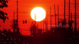 Spectacular fireball red sunset in Greater Toronto as autumn weather soon gives way to winter