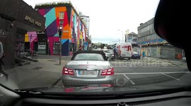 Cyclist almost hit by the Lunatic Van Driver