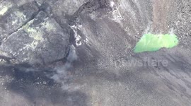 Bright green pond spotted in the crater of Hawaii's Kilauea volcano