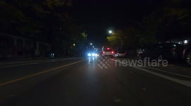 Dark evening POV driving shot in downtown streets of Toronto as the days get shorter and shorter as winter approaches