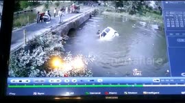 Terrifying video shows car carrying family of five thrown into river after headlong collision in north India