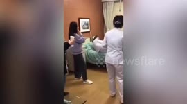 Chinese nurses suspended after taking turns to lay in hospital bed used by famous Singaporean singer