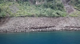 Aerial Footage Of Tsunami Damage Near Anak Krakatau Volcano After It Collapsed Into Sea