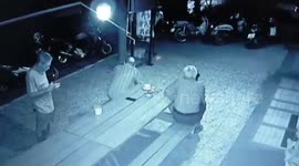 Brazen thief steals British pensioner's phone while he has coffee with friends