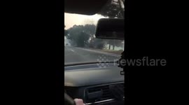 Smoky path driving past the Sunset Hills Country Club on Olsen Rd.