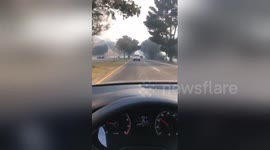 Newsflare Edit - Smoky path driving past the Sunset Hills Country Club on Olsen Rd.