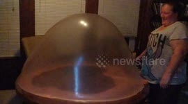 Epic slow-motion footage of huge slime bubble is strangely mesmerising