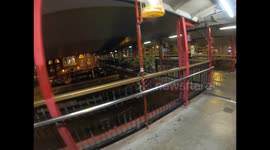 Riot police incite aggressively a passerby to leave a footbridge in Central Hong Kong