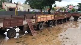 Indian officials build 50-foot trolley bridge to help people vote in flooded village