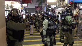 Journalists charged and pepper-sprayed by Hong Kong riot police