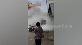 Power bank bursts into flames after being left in car boot under the sun