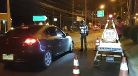 Police set up road blocks in hunt for American who escaped from prison in Thailand