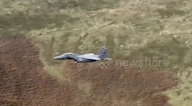 F15's in the Mach Loop Wales u.k, doing low flying training exercises.