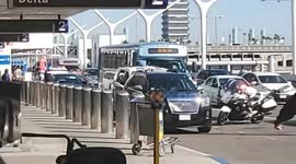 Lax Airport Police on a man said he had a gun and push his way in to tsa checkpoint