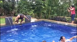 The giant entered the pool, and the people inside panicked