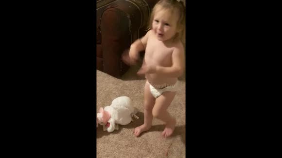 2yr old dramatically acts like the mother goose toy bites her.