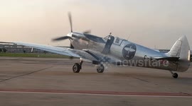 Restored Silver Spitfire takes off from Bangkok airport during round-the-world trip