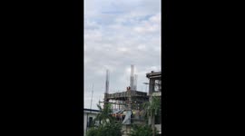 Builders dance on top of unfinished building as cops have Zumba class next door