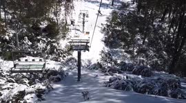 Riding a lift at Mount Buller
