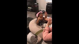 Cute Blasian baby reaction laugh with nanny and family