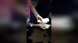 Florida magician turns single dollars into tens, stunning crowd at EDM festival