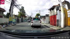 Clumsy driver takes out THREE motorcycle riders in ten seconds by opening doors without checking mirrors