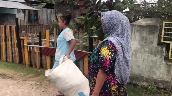 Indonesian community processes plastic waste into gasoline and diesel