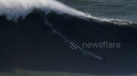 French surfer Justine Dupont 'breaks world record' for biggest wave ever ridden by a woman, conquering 70ft monster in Portugal