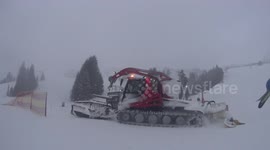 Snowcat preparing for skiing