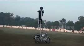 Indian daredevil rides 128km on a ladder on a motorbike, backwards