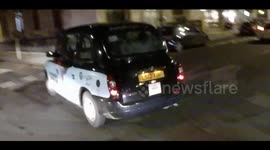 LS12 XUH Impatient London taxi cabbie pulls in front of motorcycle.