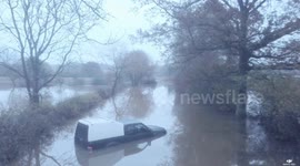 Drone footage captures devastating damage caused by flooding at UK reservoir