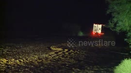 Around 100 vehicles stuck and drivers trapped on California State Route 62 as recent storms cause heavy roadway flooding