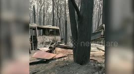 AUSTRALIA BUSHFIRES: Man stands in the ruins of burned property