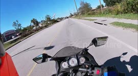 US motorcyclist narrowly dodges daredevil Heron that comes out of nowhere
