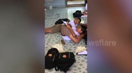 Thai pupil shows off his extremely flexible body in class