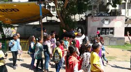 Little Girls Plays Around Disney Character