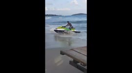 Thai beachgoer makes 'Baywatch'-style rescue on jetski to save drowning boy