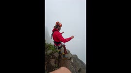 Into the abyss: Brazilian slackliner launches himself off canyon into 110-metre-high cloudy chasm