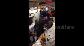 'Most heartwarming thing I’ve ever seen': Thanksgiving feast on NYC subway